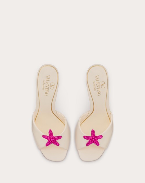 Red Valentino SANDALO SLIDE VALENTINO GARAVANI ESCAPE IN VITELLO CON RICAMO STARFISH 90MM Offerta per la Festa della Mamma