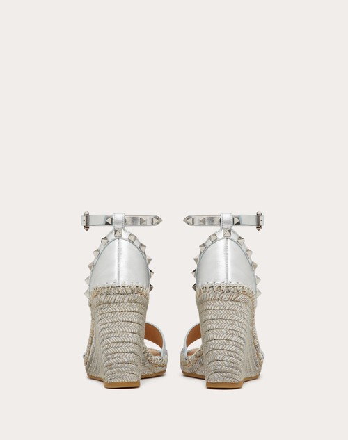 Red Valentino SANDALO ZEPPA ROCKSTUD DOUBLE IN NAPPA LAMINATA 105 MM Offerta