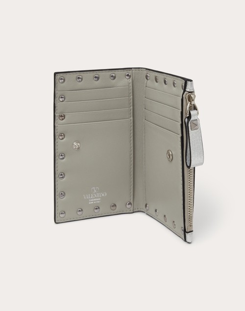 Red Valentino PORTACARTE CON ZIP ROCKSTUD IN VITELLO GRANATO METALLIZZATO Offerta migliore